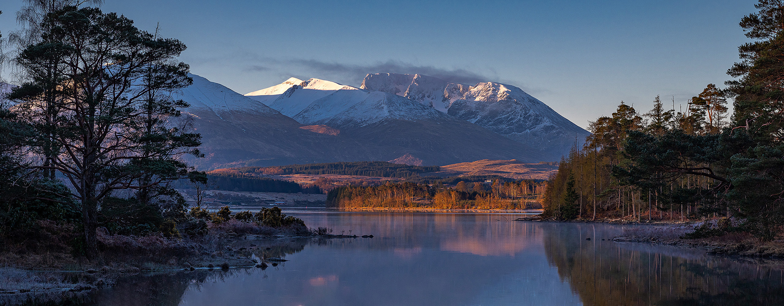 Ben Nevis in morning light across Loch Lochy - Mountain Images by Ian Evans